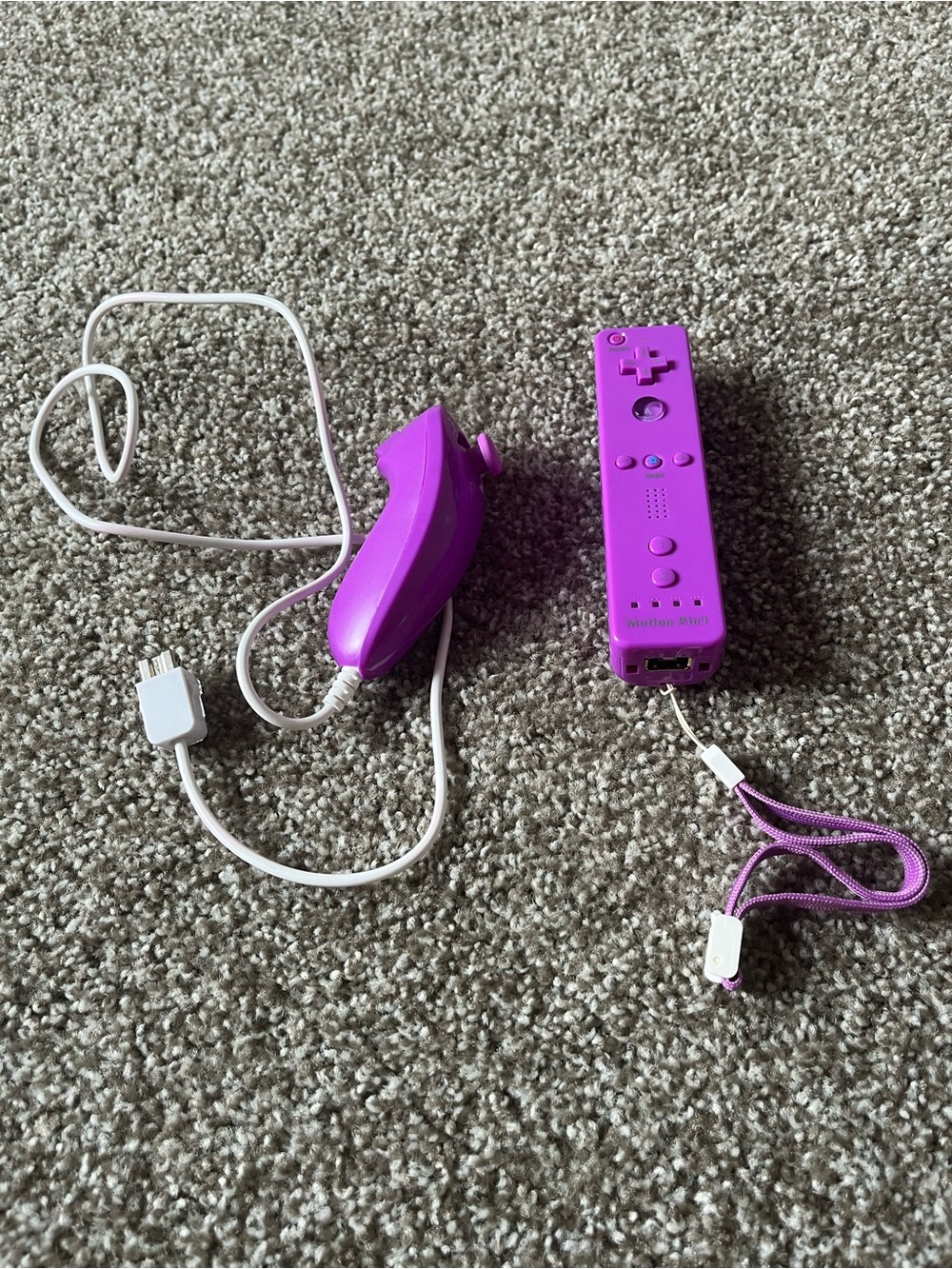 Nintendo Purple Wii Remote and Nunchuk Controller Set